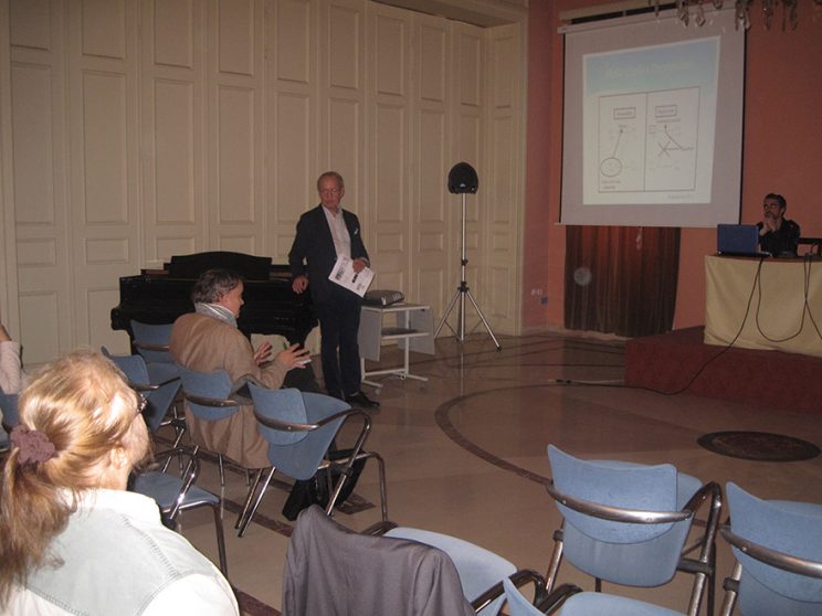 The Greek delegation talking at the Ritsos Hall, Cultural Center of Ermoupolis